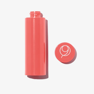 The Nine Aurora Lucis Protecting Day Serum refill pod — plain product packshot on white, original photoshoot